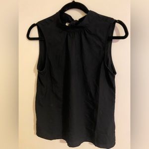 Sleeveless blouse with tie back